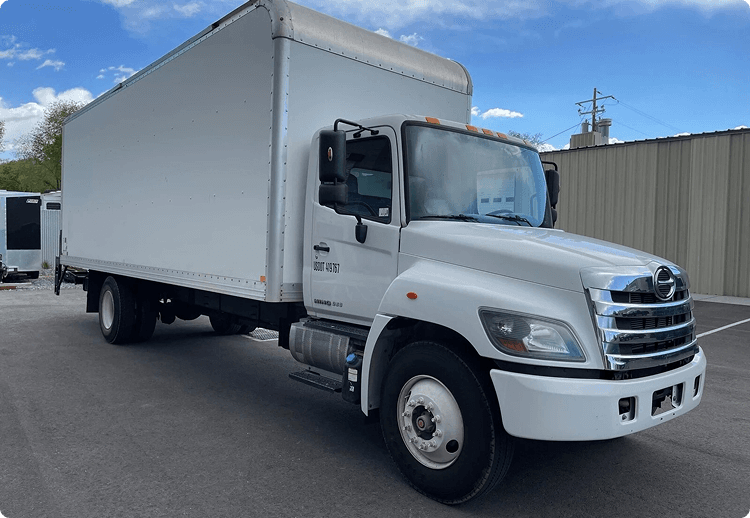 White box truck parked in a lot